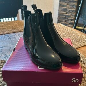 Black slick boots